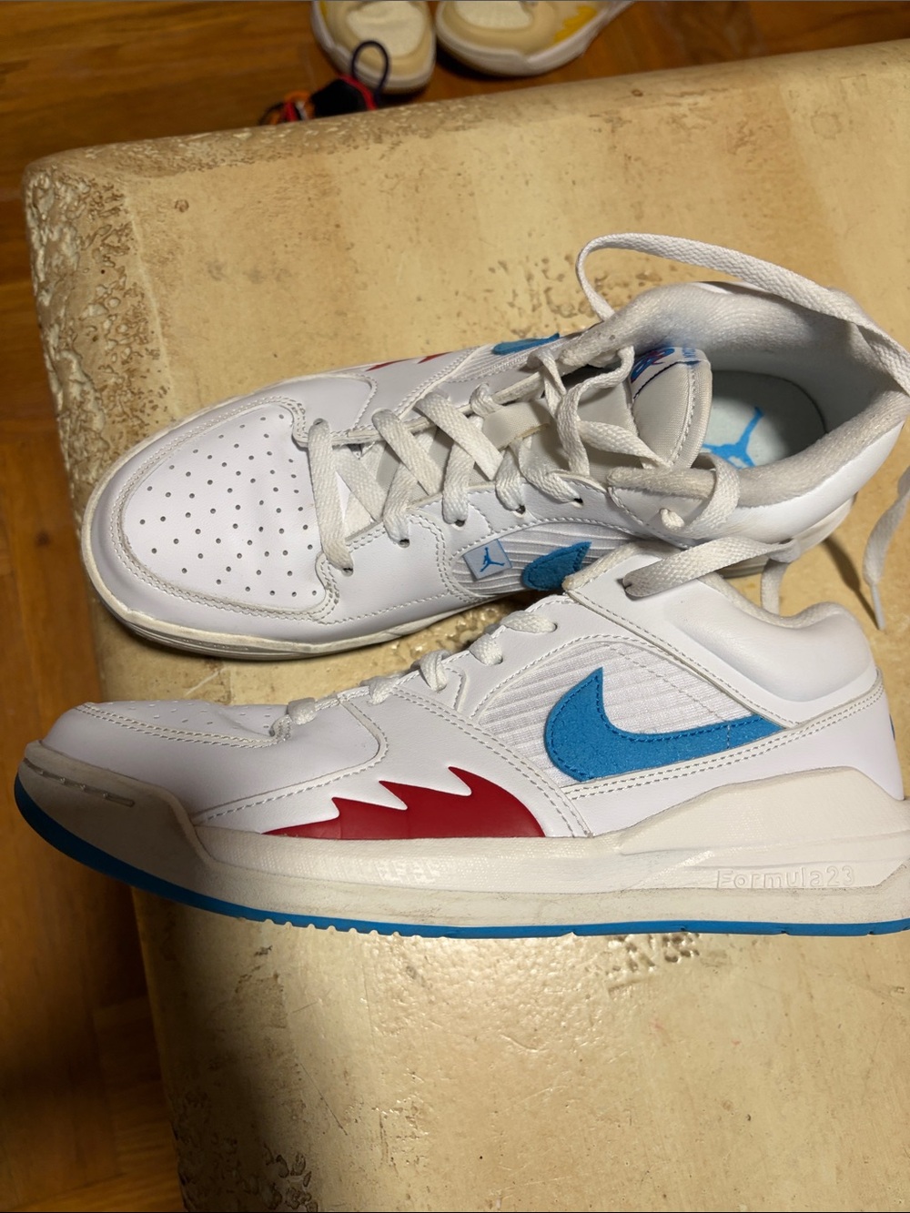 Nike Air Jordan Women’s White Sneakers with Blue Accents